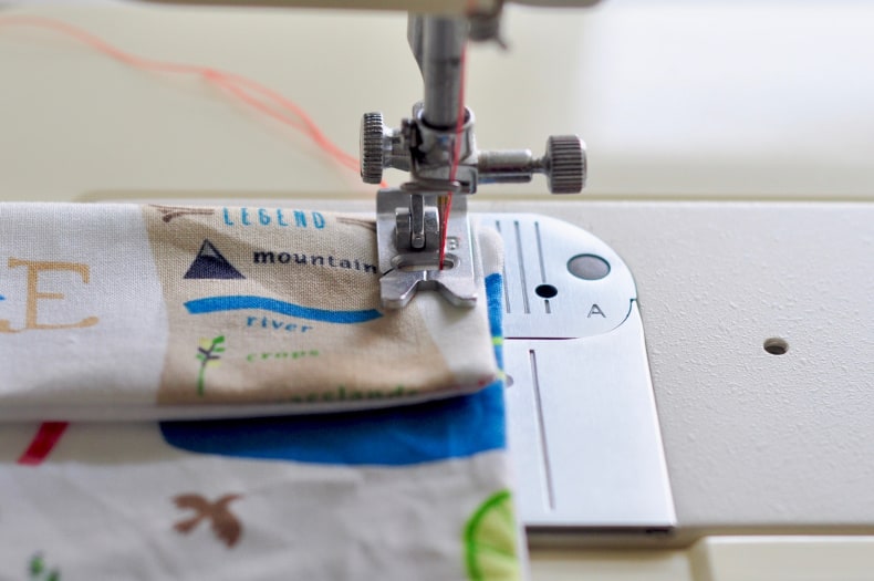 The outer seams of the snack bags are sewn on a sewing machine.