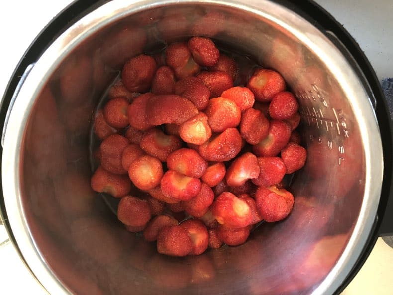 making homemade strawberry jam - strawberries in the instant pot