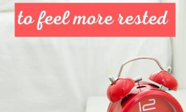 image of a white table and bedding with a red alarm clock, with red text overlay for pinterest that reads 8 natural sleep tips to feel more rested